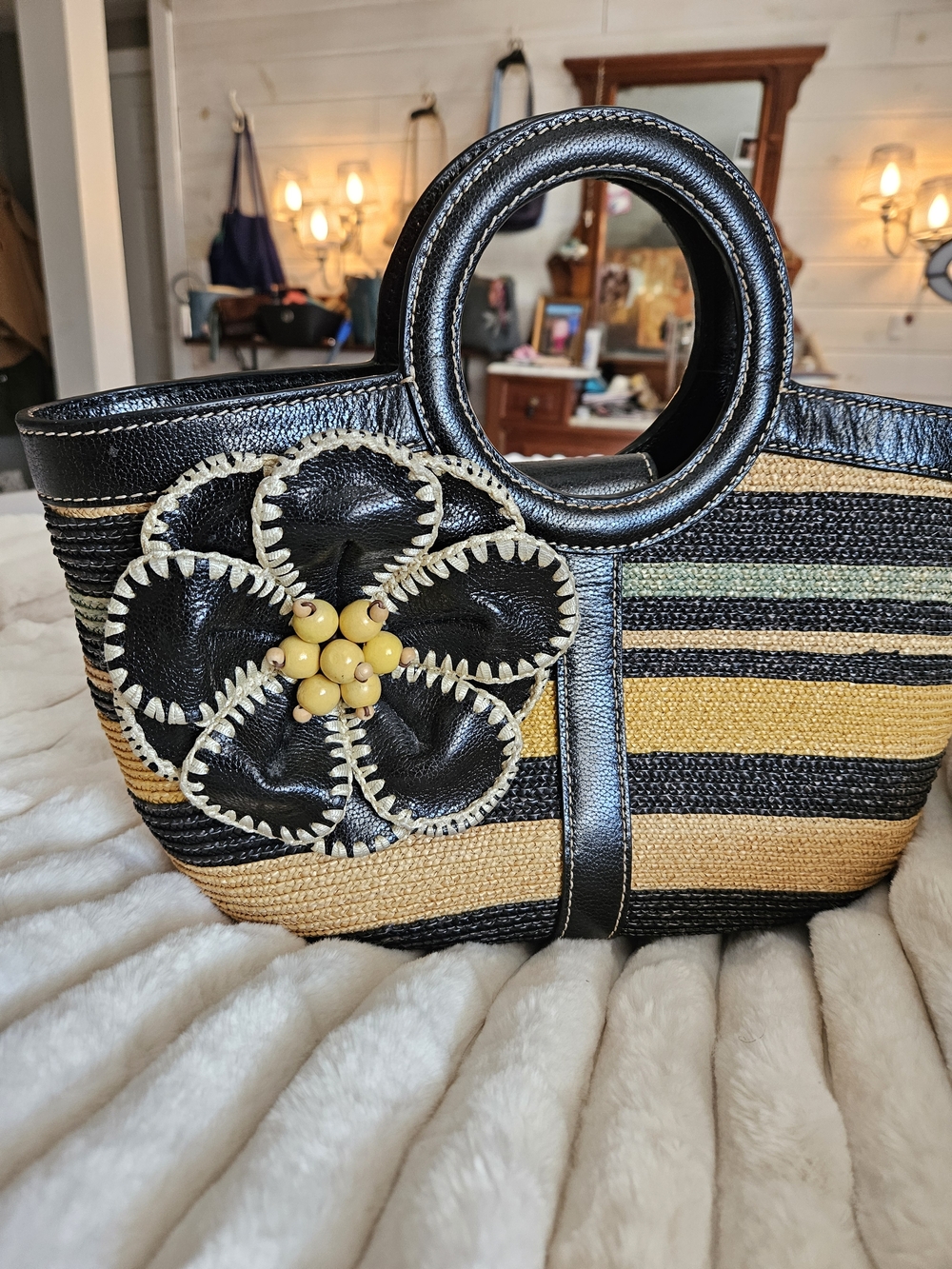 Isabella Fiore Black and Yellow Striped Straw Tote with Floral Accent